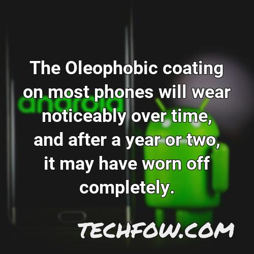 the oleophobic coating on most phones will wear noticeably over time and after a year or two it may have worn off completely