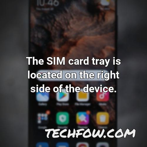 the sim card tray is located on the right side of the device