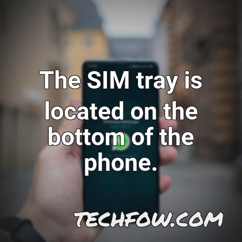 the sim tray is located on the bottom of the phone