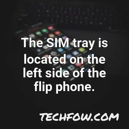 the sim tray is located on the left side of the flip phone