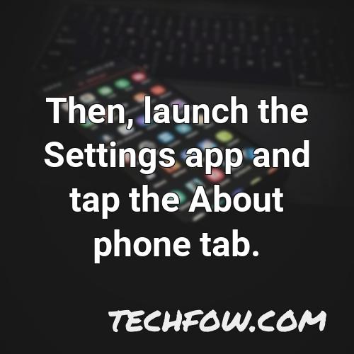 then launch the settings app and tap the about phone tab