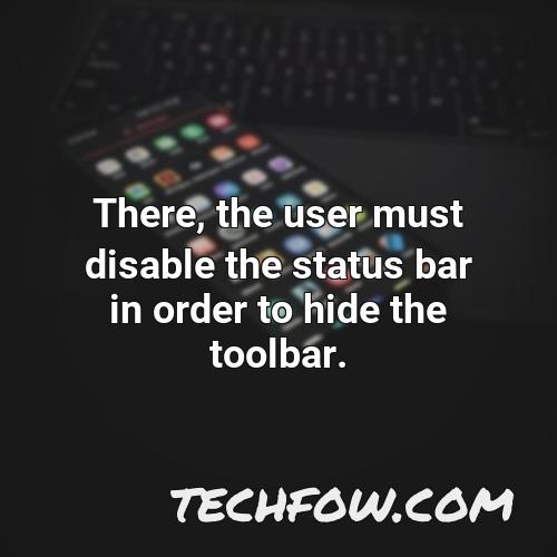 there the user must disable the status bar in order to hide the toolbar