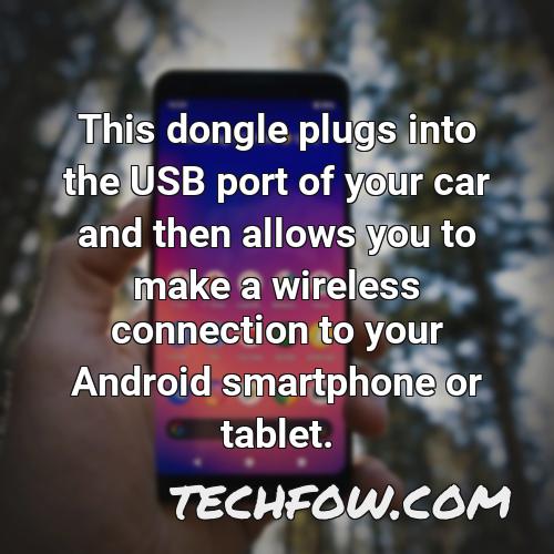 this dongle plugs into the usb port of your car and then allows you to make a wireless connection to your android smartphone or tablet