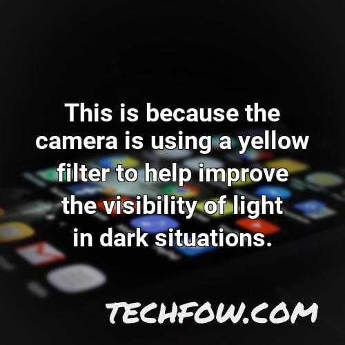 this is because the camera is using a yellow filter to help improve the visibility of light in dark situations