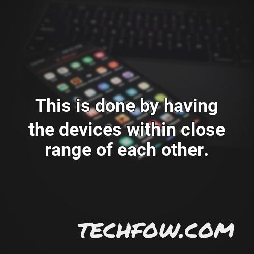 this is done by having the devices within close range of each other