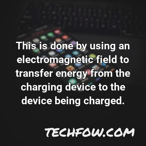 this is done by using an electromagnetic field to transfer energy from the charging device to the device being charged