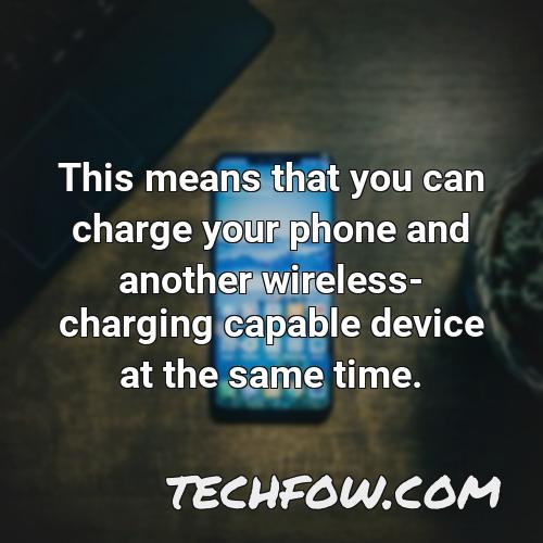 this means that you can charge your phone and another wireless charging capable device at the same time