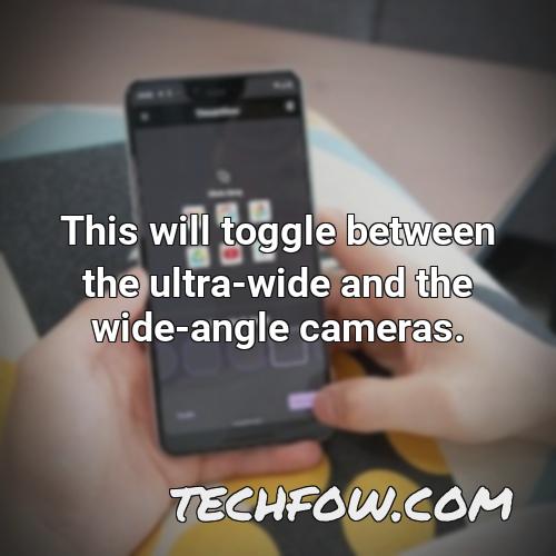this will toggle between the ultra wide and the wide angle cameras