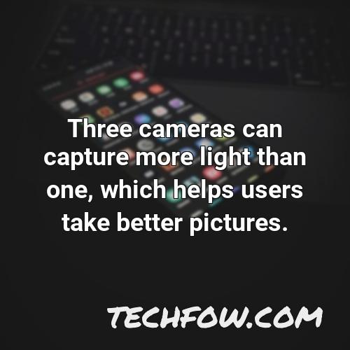 three cameras can capture more light than one which helps users take better pictures