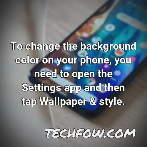 to change the background color on your phone you need to open the settings app and then tap wallpaper style