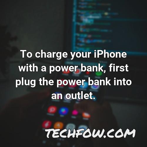 to charge your iphone with a power bank first plug the power bank into an outlet