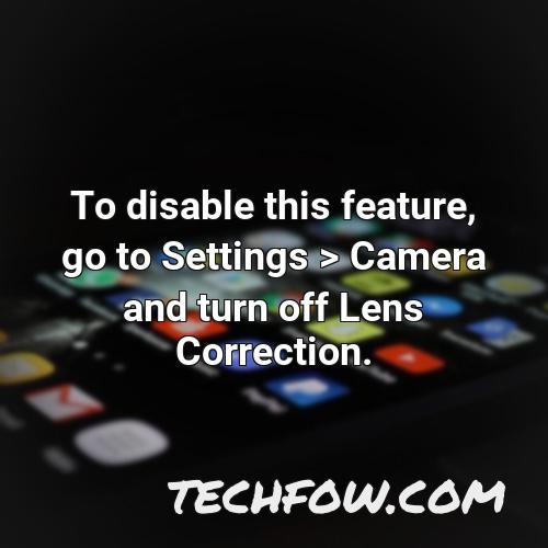 to disable this feature go to settings camera and turn off lens correction