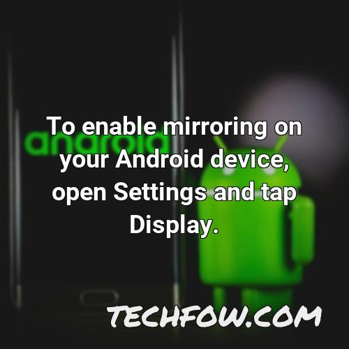 to enable mirroring on your android device open settings and tap display
