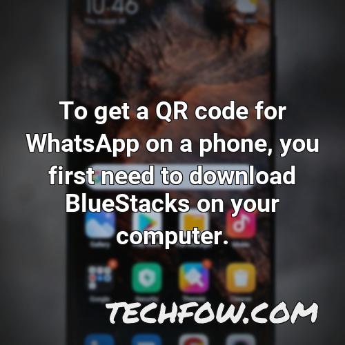 to get a qr code for whatsapp on a phone you first need to download bluestacks on your computer