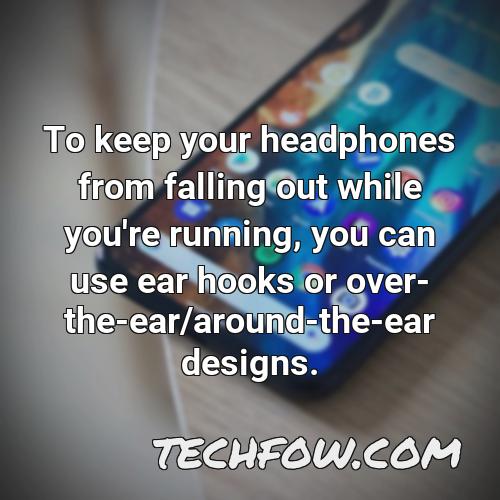 to keep your headphones from falling out while you re running you can use ear hooks or over the ear around the ear designs