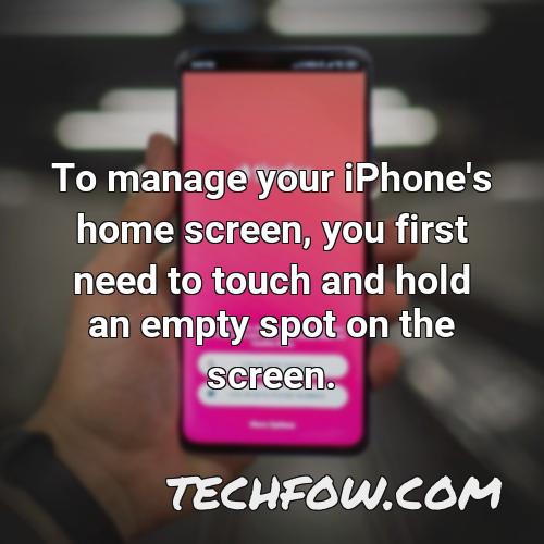 to manage your iphone s home screen you first need to touch and hold an empty spot on the screen