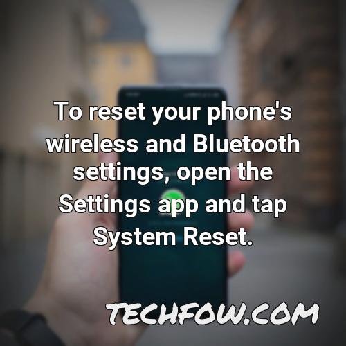 to reset your phone s wireless and bluetooth settings open the settings app and tap system reset