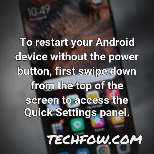 to restart your android device without the power button first swipe down from the top of the screen to access the quick settings panel