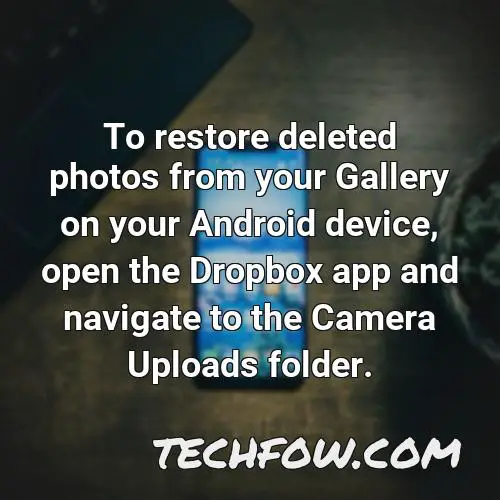 to restore deleted photos from your gallery on your android device open the dropbox app and navigate to the camera uploads folder