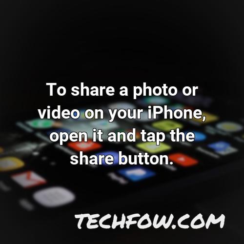 to share a photo or video on your iphone open it and tap the share button
