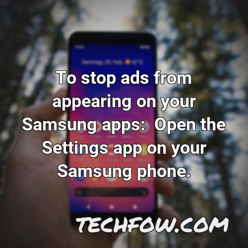 to stop ads from appearing on your samsung apps open the settings app on your samsung phone