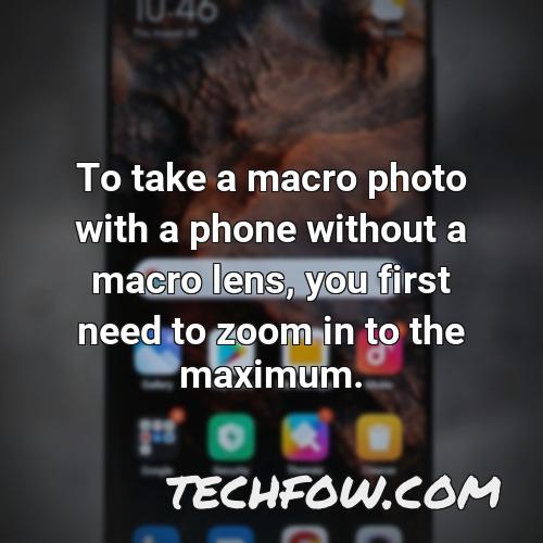 to take a macro photo with a phone without a macro lens you first need to zoom in to the