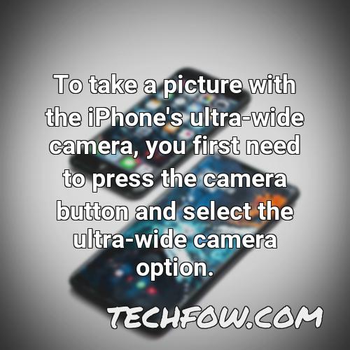 to take a picture with the iphone s ultra wide camera you first need to press the camera button and select the ultra wide camera option