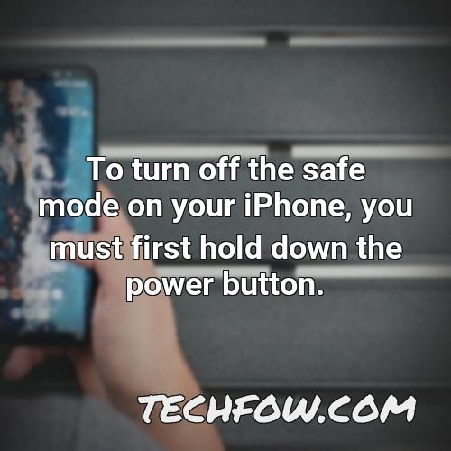 to turn off the safe mode on your iphone you must first hold down the power button