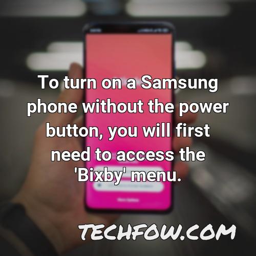 to turn on a samsung phone without the power button you will first need to access the bixby menu