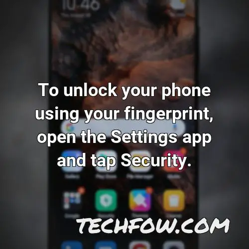 to unlock your phone using your fingerprint open the settings app and tap security