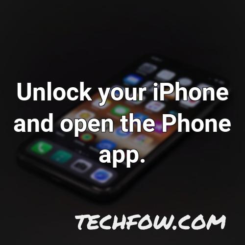 unlock your iphone and open the phone app