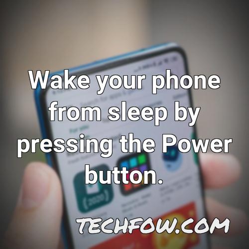 wake your phone from sleep by pressing the power button