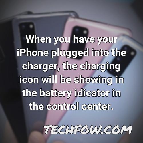 when you have your iphone plugged into the charger the charging icon will be showing in the battery idicator in the control center