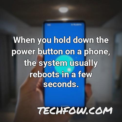 when you hold down the power button on a phone the system usually reboots in a few seconds