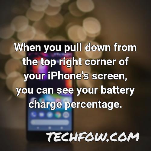 when you pull down from the top right corner of your iphone s screen you can see your battery charge percentage