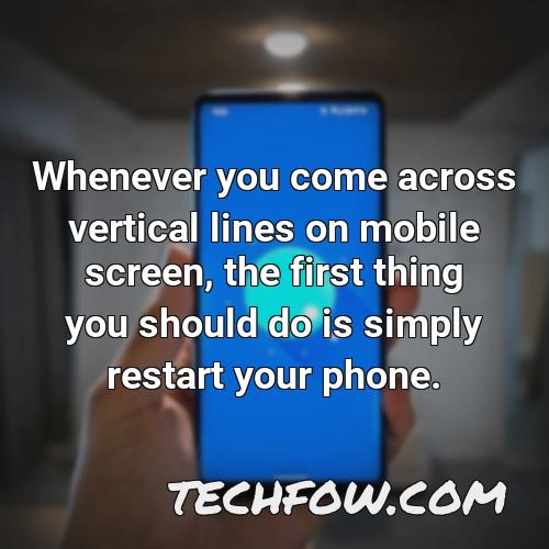 whenever you come across vertical lines on mobile screen the first thing you should do is simply restart your phone