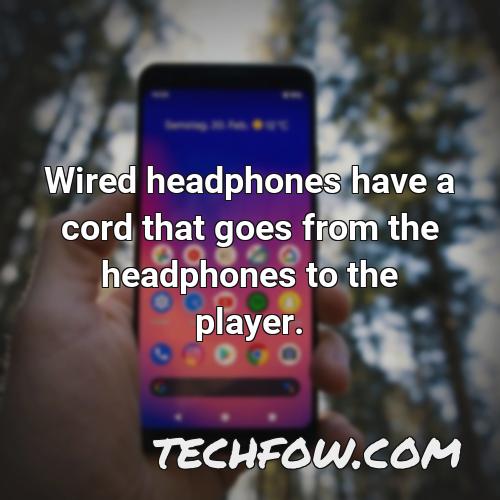 wired headphones have a cord that goes from the headphones to the player