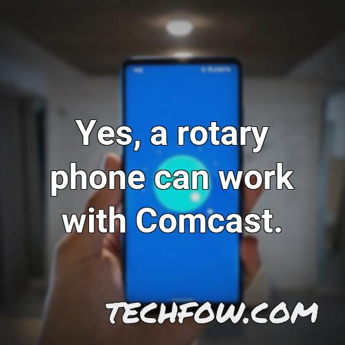 yes a rotary phone can work with comcast