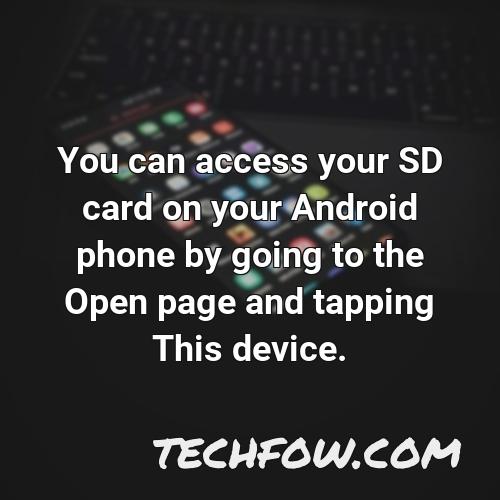 you can access your sd card on your android phone by going to the open page and tapping this device