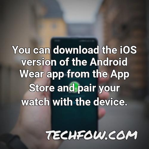 you can download the ios version of the android wear app from the app store and pair your watch with the device 2