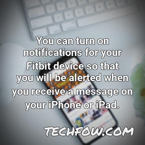 you can turn on notifications for your fitbit device so that you will be alerted when you receive a message on your iphone or ipad