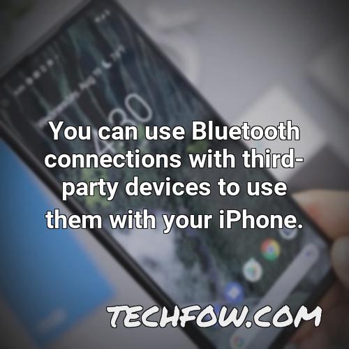 you can use bluetooth connections with third party devices to use them with your iphone