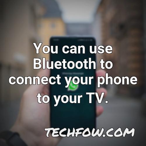you can use bluetooth to connect your phone to your tv