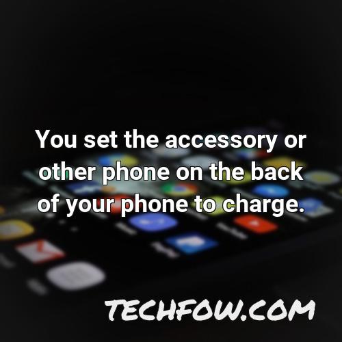 you set the accessory or other phone on the back of your phone to charge