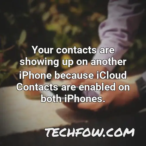 your contacts are showing up on another iphone because icloud contacts are enabled on both iphones