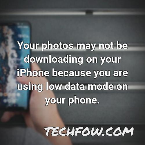 your photos may not be downloading on your iphone because you are using low data mode on your phone